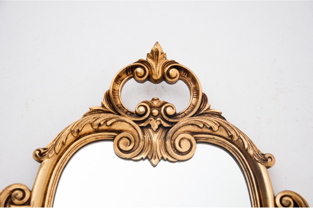 Mirror in a golden frame, Northern Europe, early 20th century.