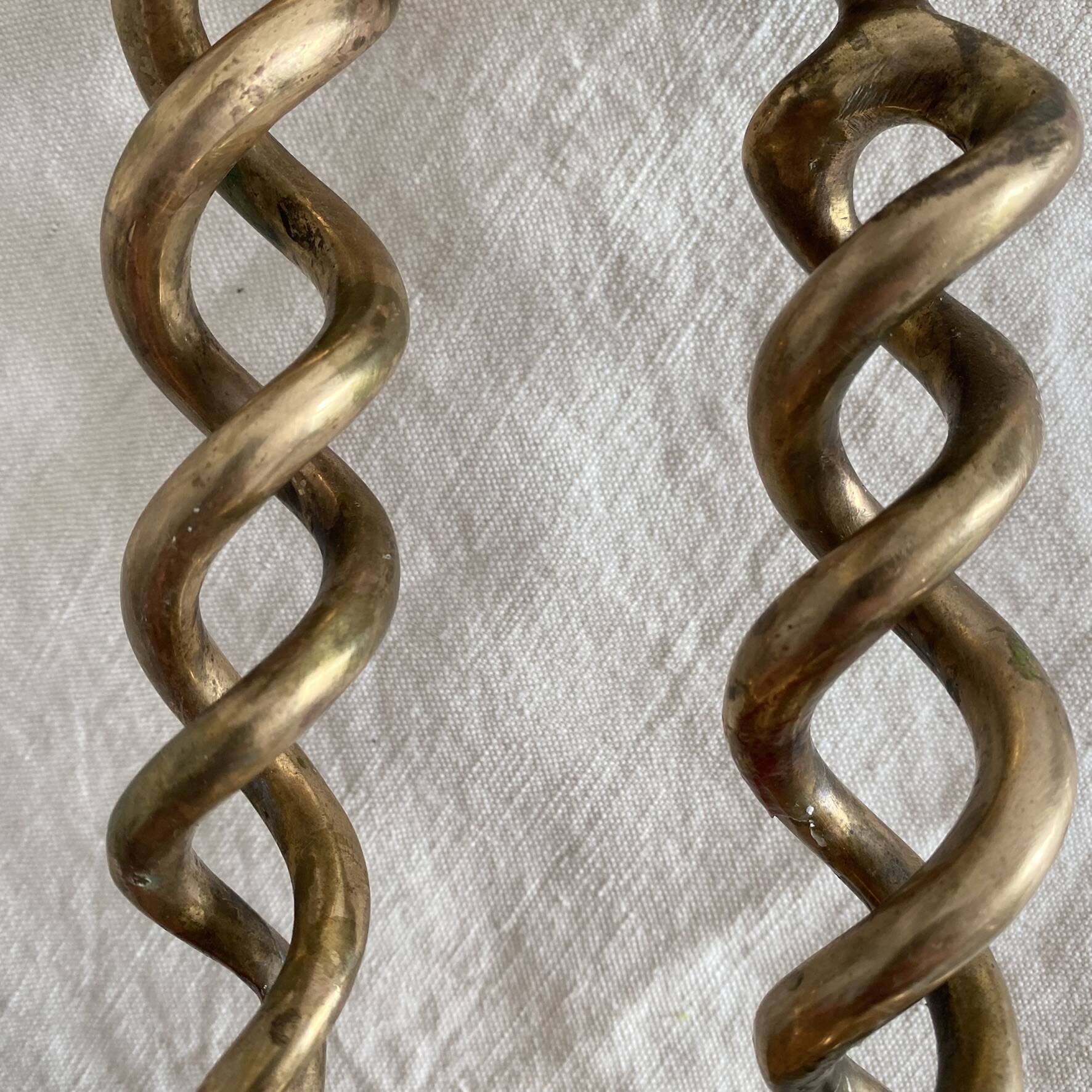 Pair of twisted brass candlesticks