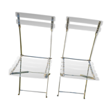 2 invisible folding chairs in metal and transparent plexiglass