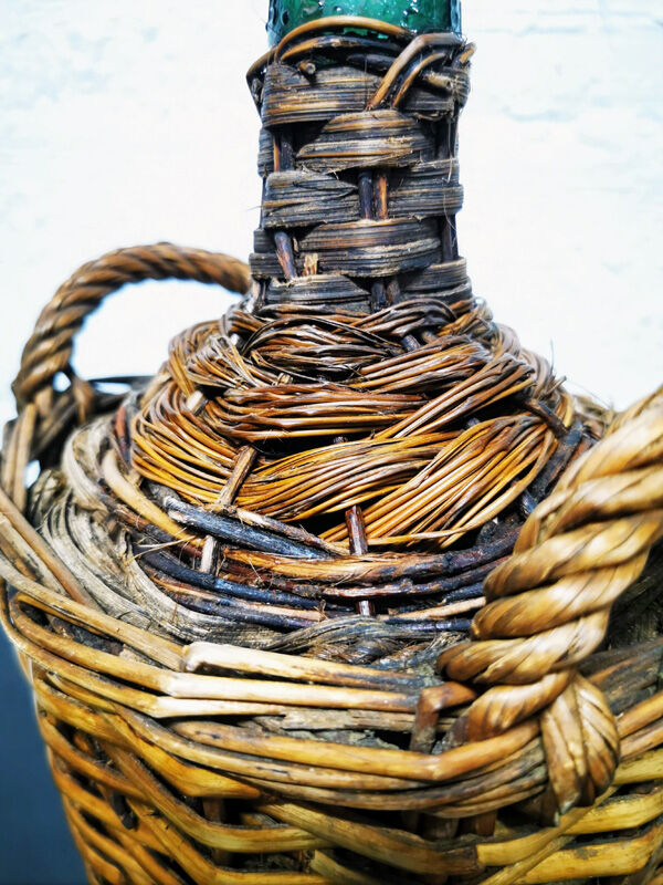 Demijohn dressed in wicker