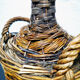 Demijohn dressed in wicker
