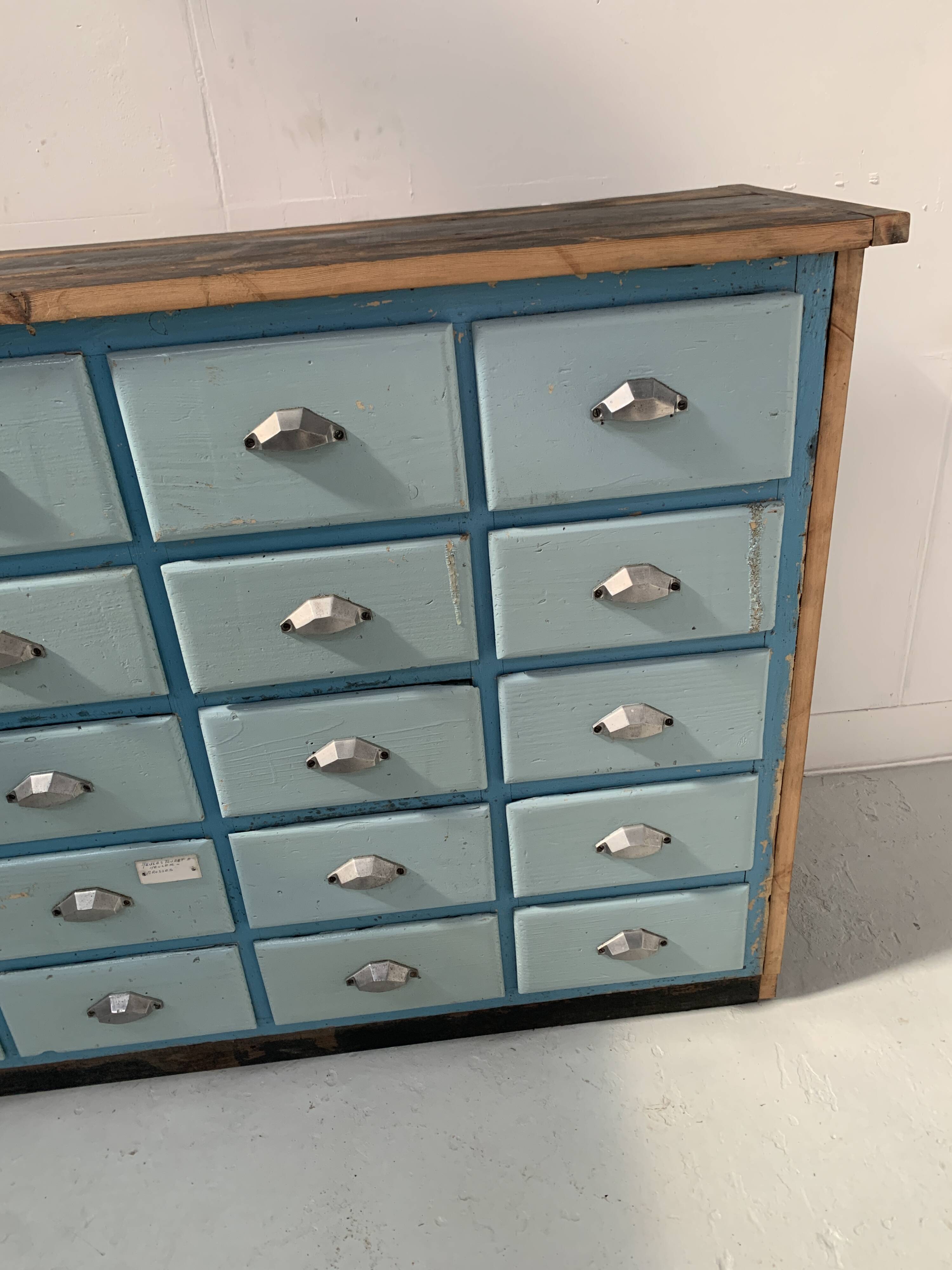 30-drawer storage unit in patinated fir, 20th century