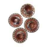 Set of etnic ceramic cups and plates