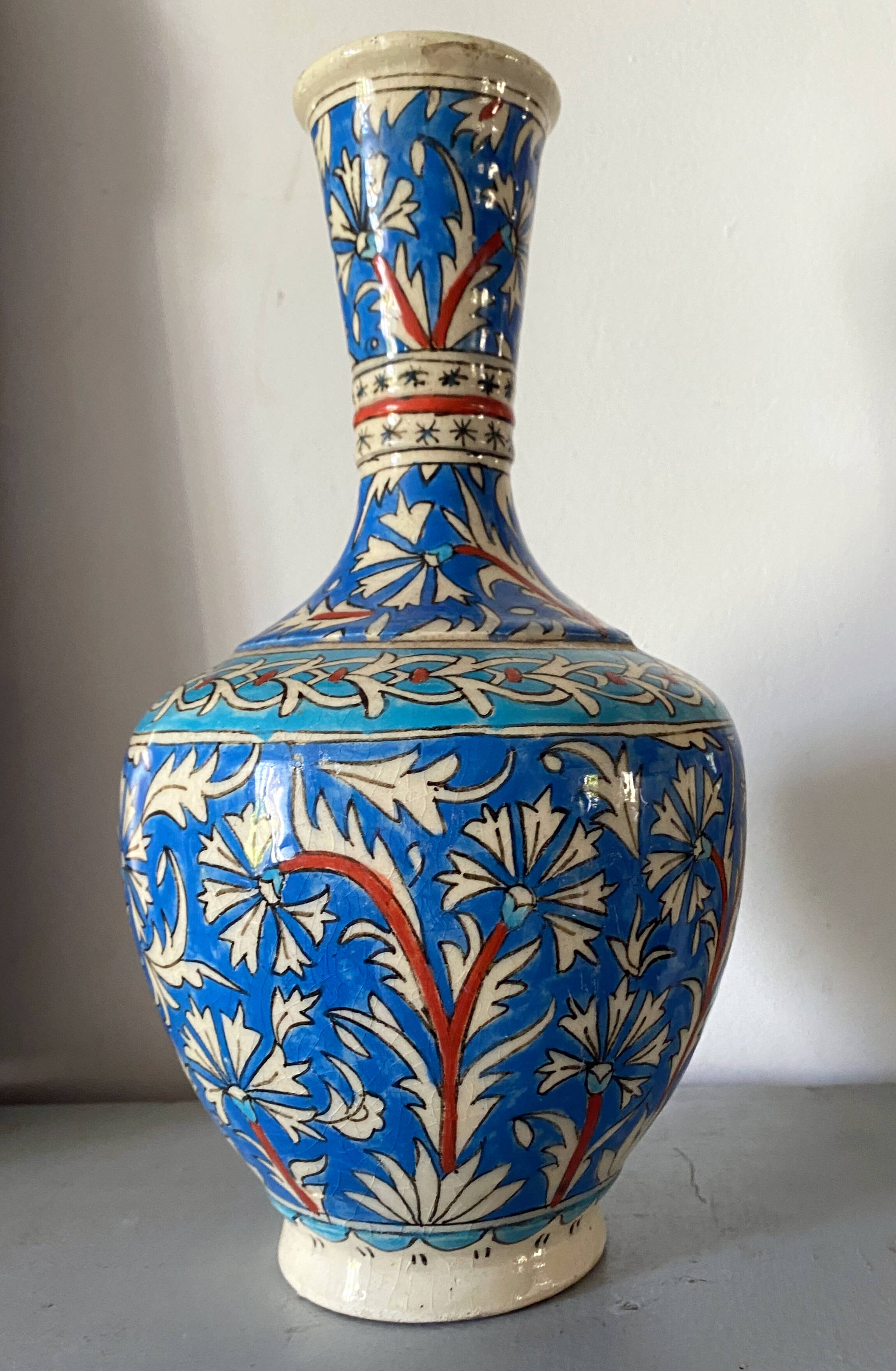 Iznic ceramic vase with blue interlacing