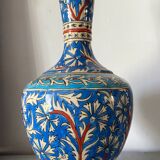 Iznic ceramic vase with blue interlacing
