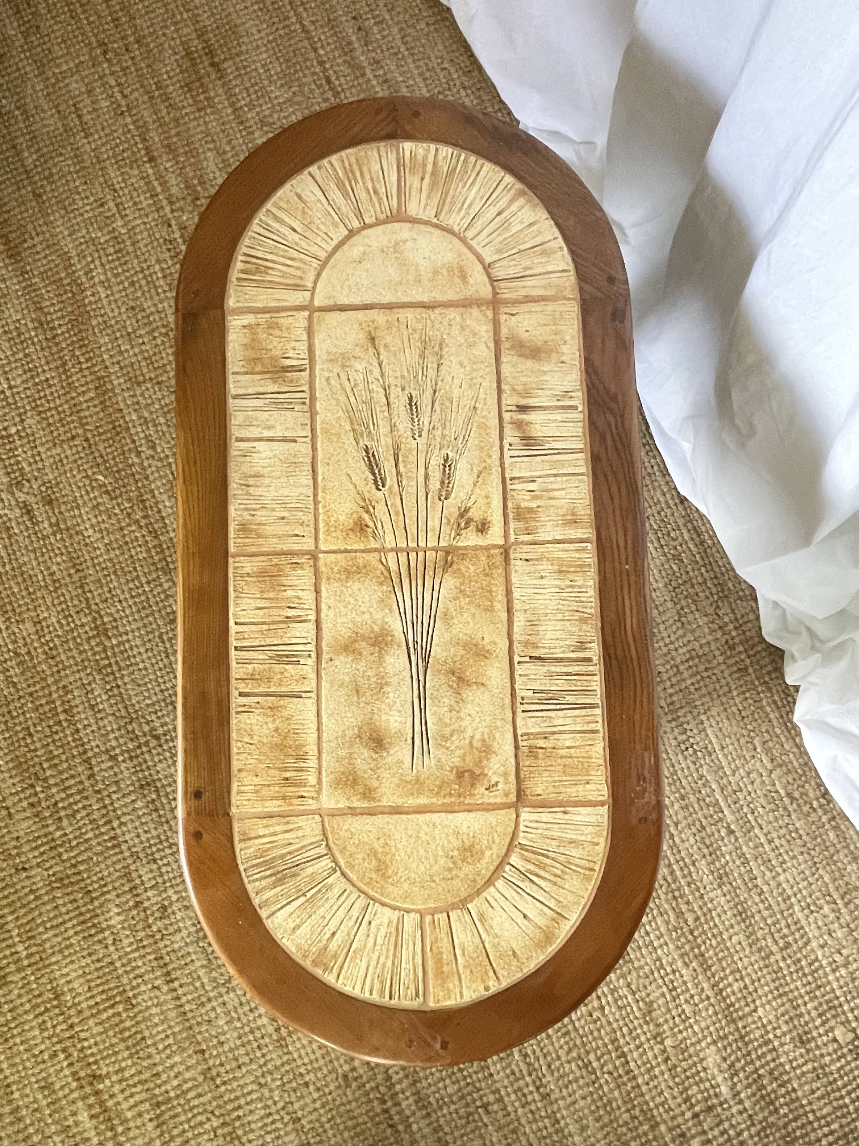 Ceramic and solid wood herbarium coffee table, signed