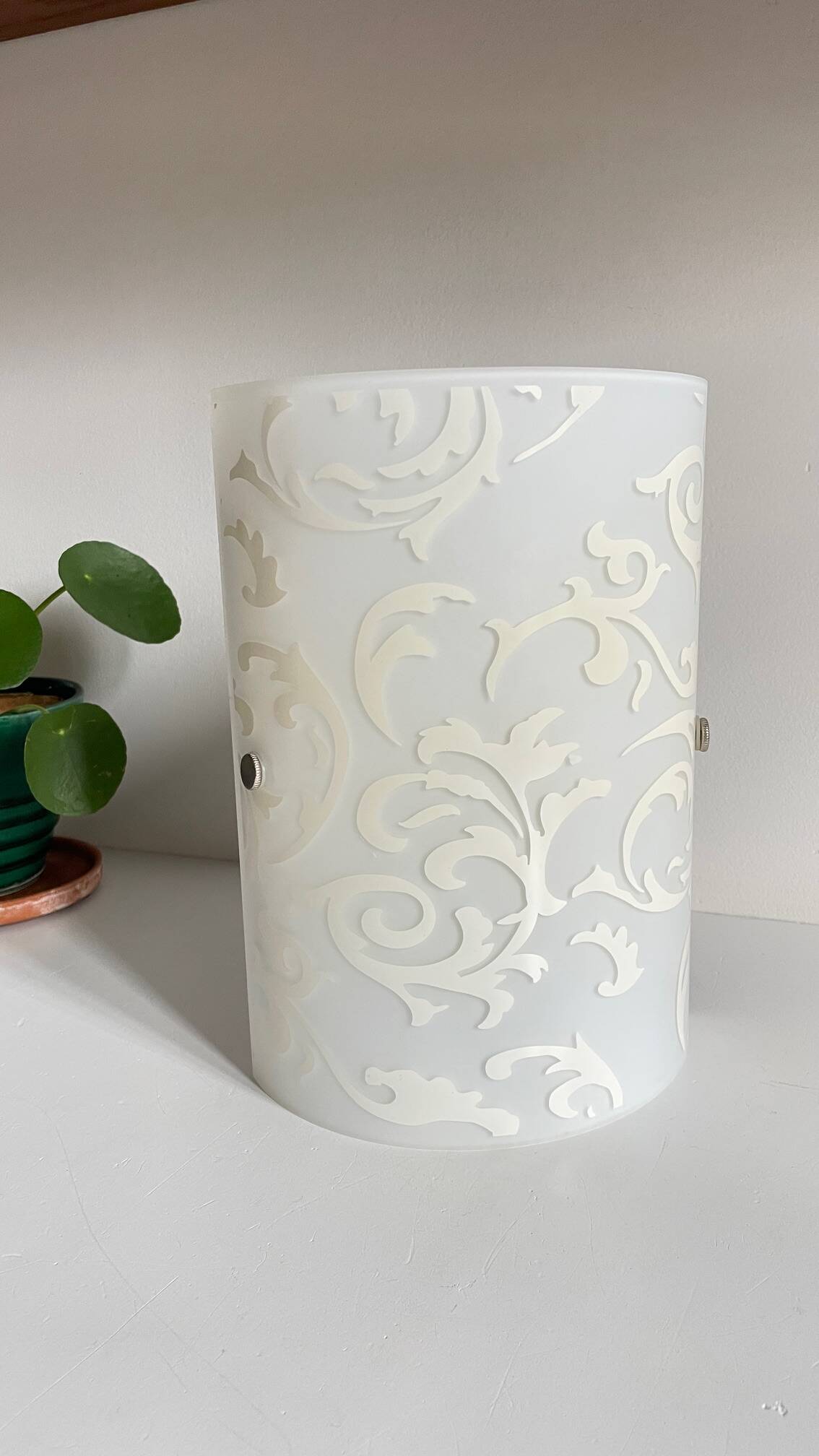 Polished and screen-printed glass sconce by eglo