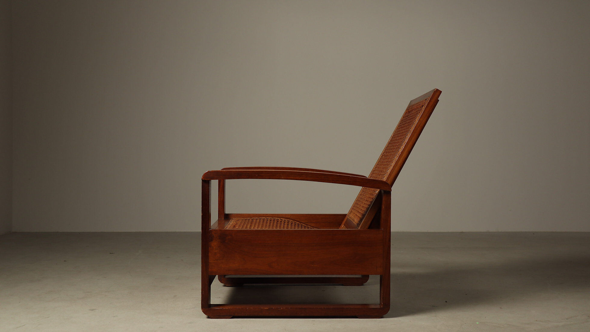 Mid-century architectural teak lounge chair with cane seat, 1950s