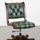 English Chesterfield office chair in green leather, height adjustable on casters