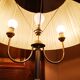 Brass lamppost with pleated lampshades