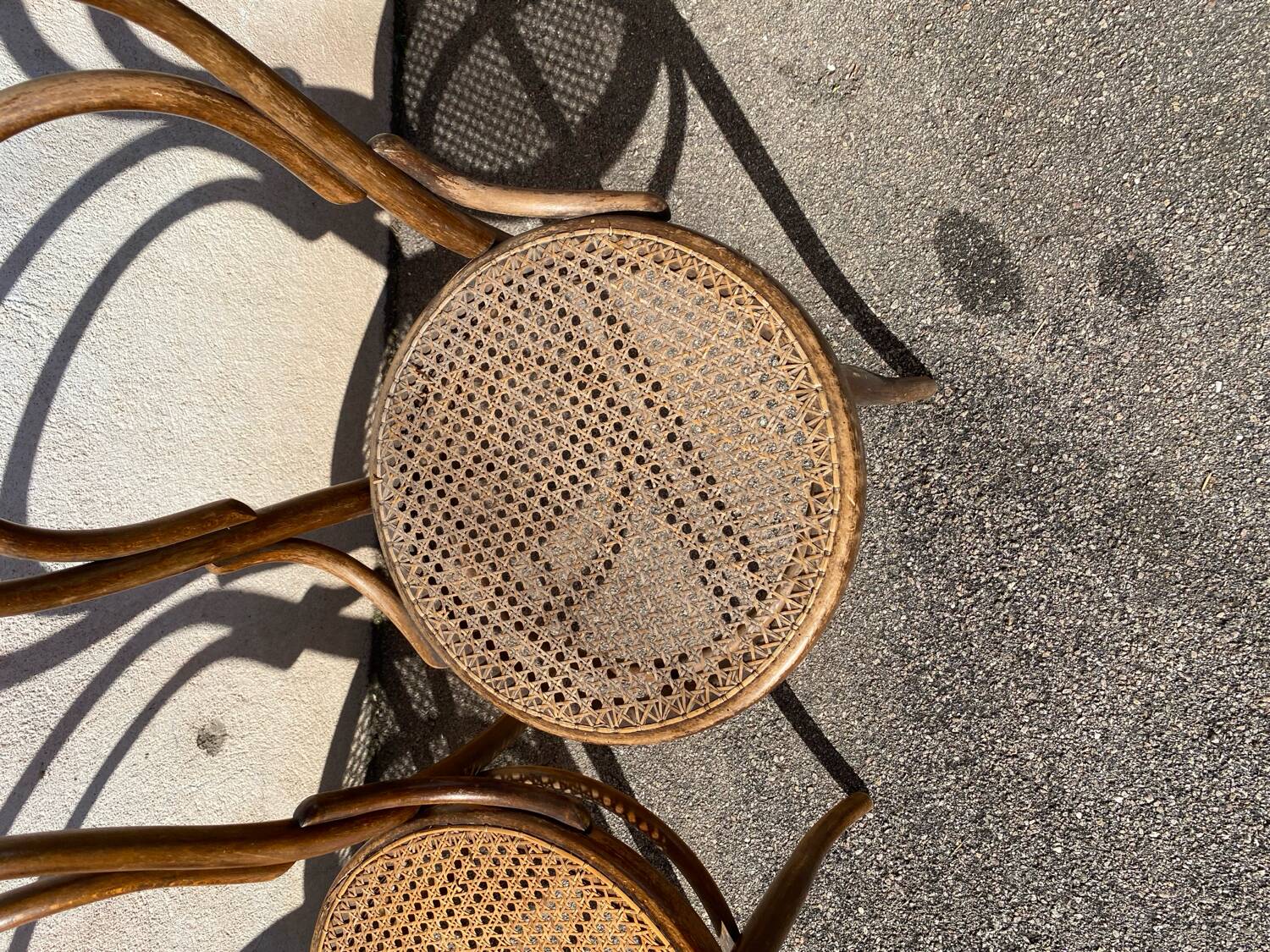 Set of 4 wooden and cane bistro chairs