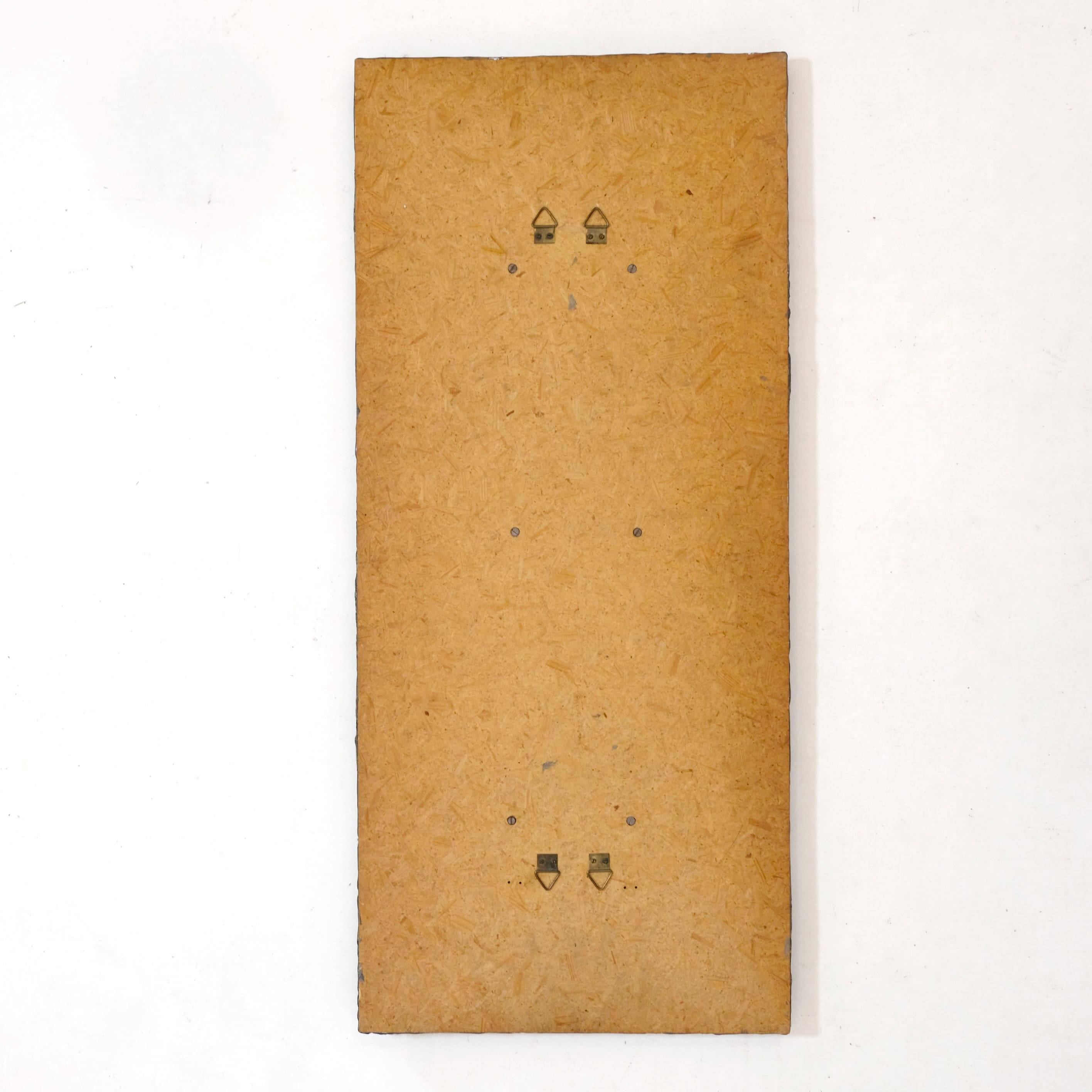 Coloured glass mirror, French work from the 1960s, 35x77 cm.