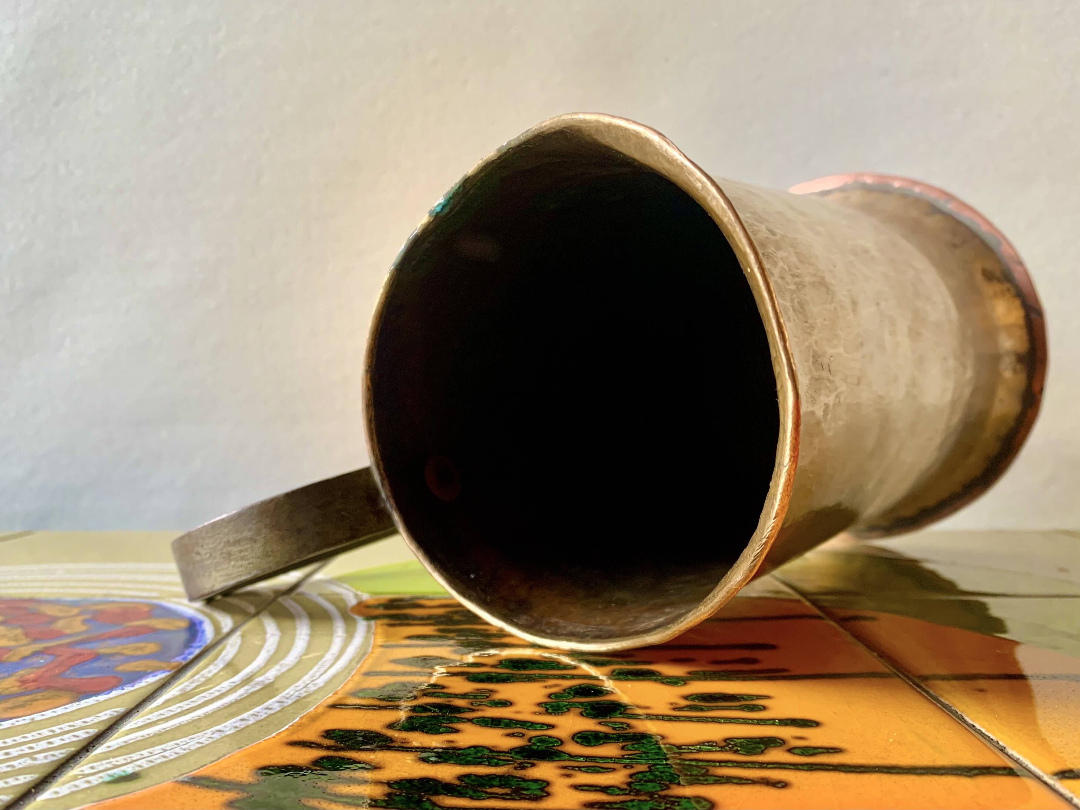 Old hammered copper water jug - artisanal work