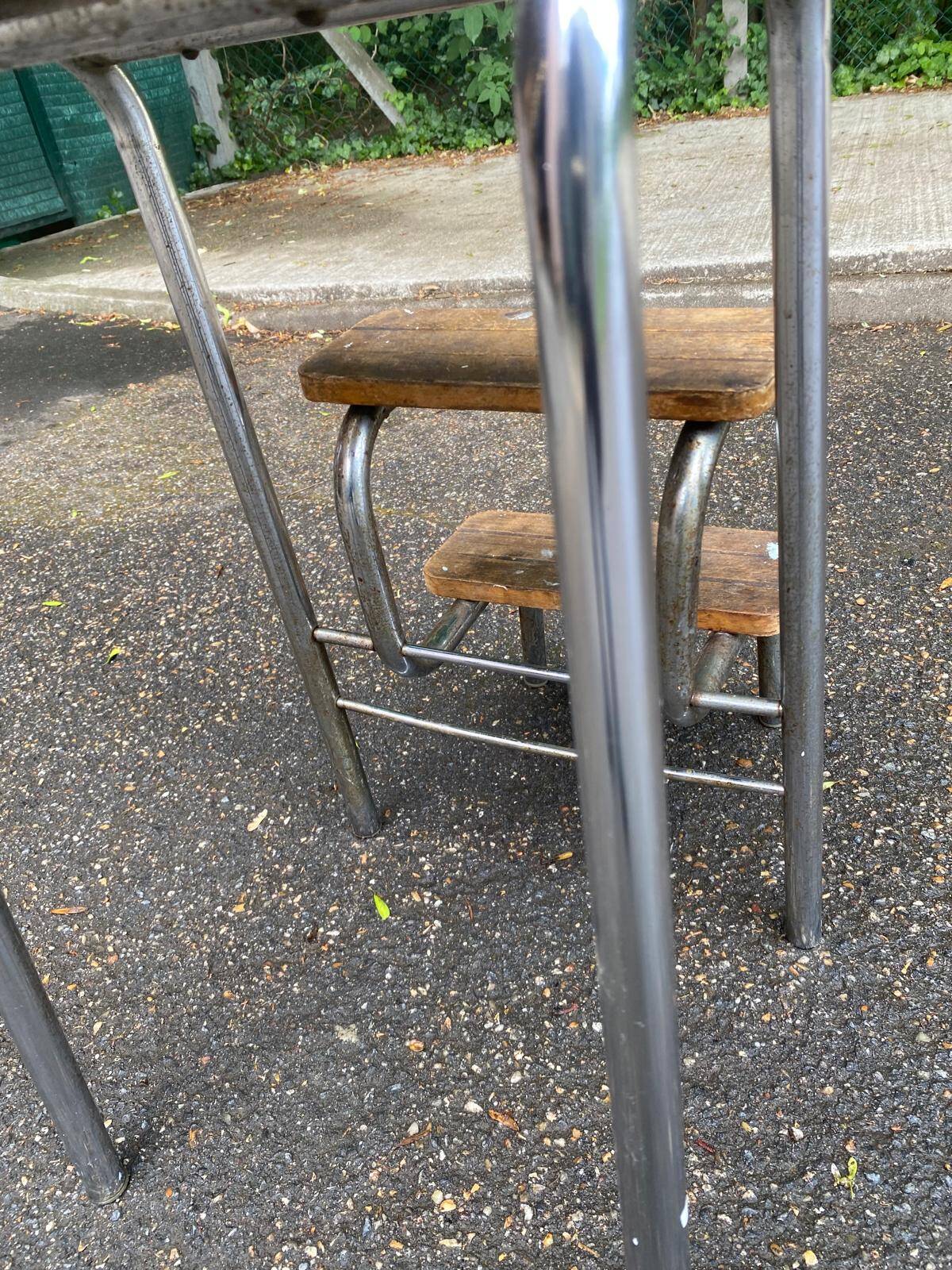 Folding stool in chrome steel, blue formica and solid wood.