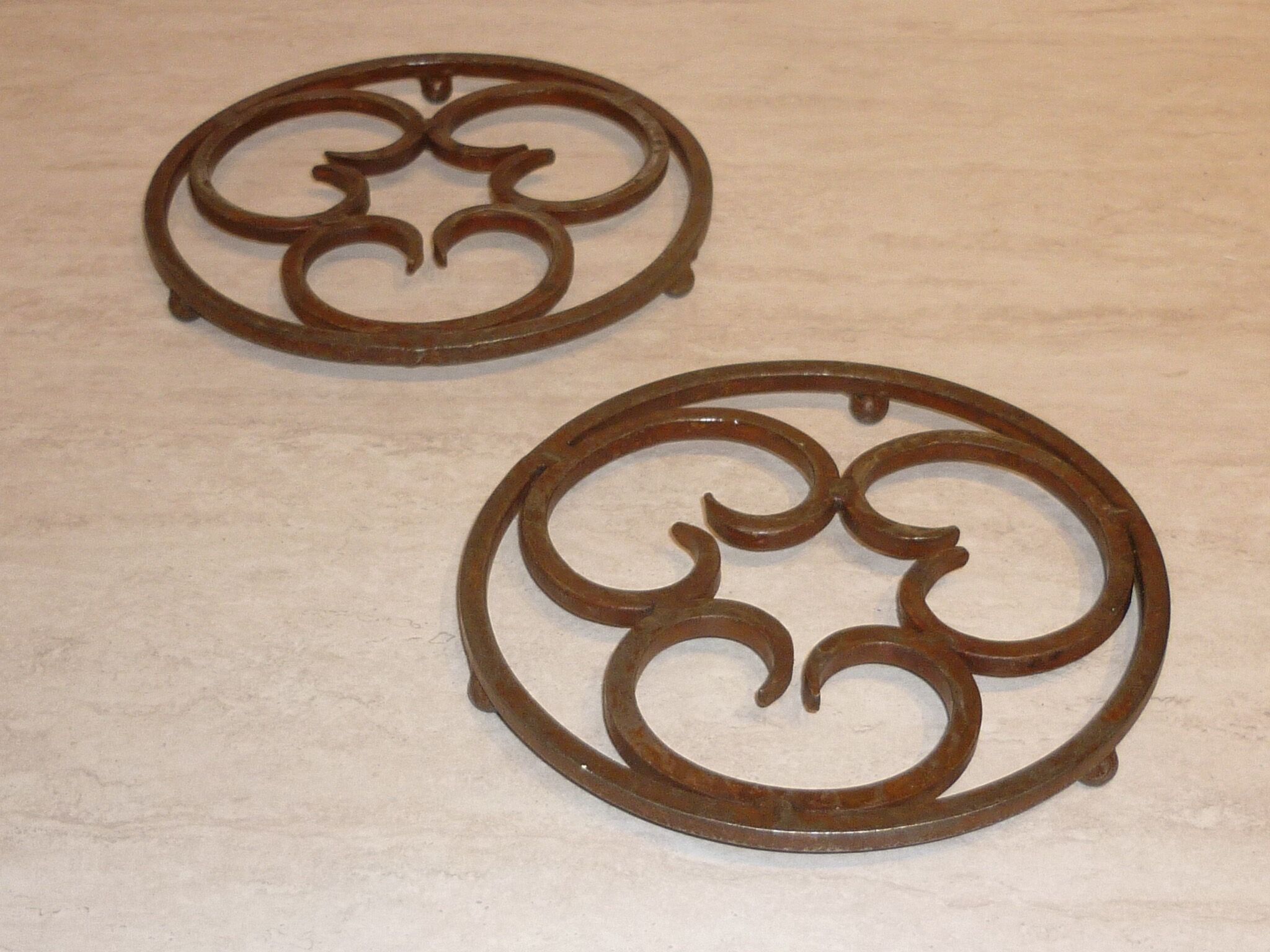 Pair of 2 wrought iron mats