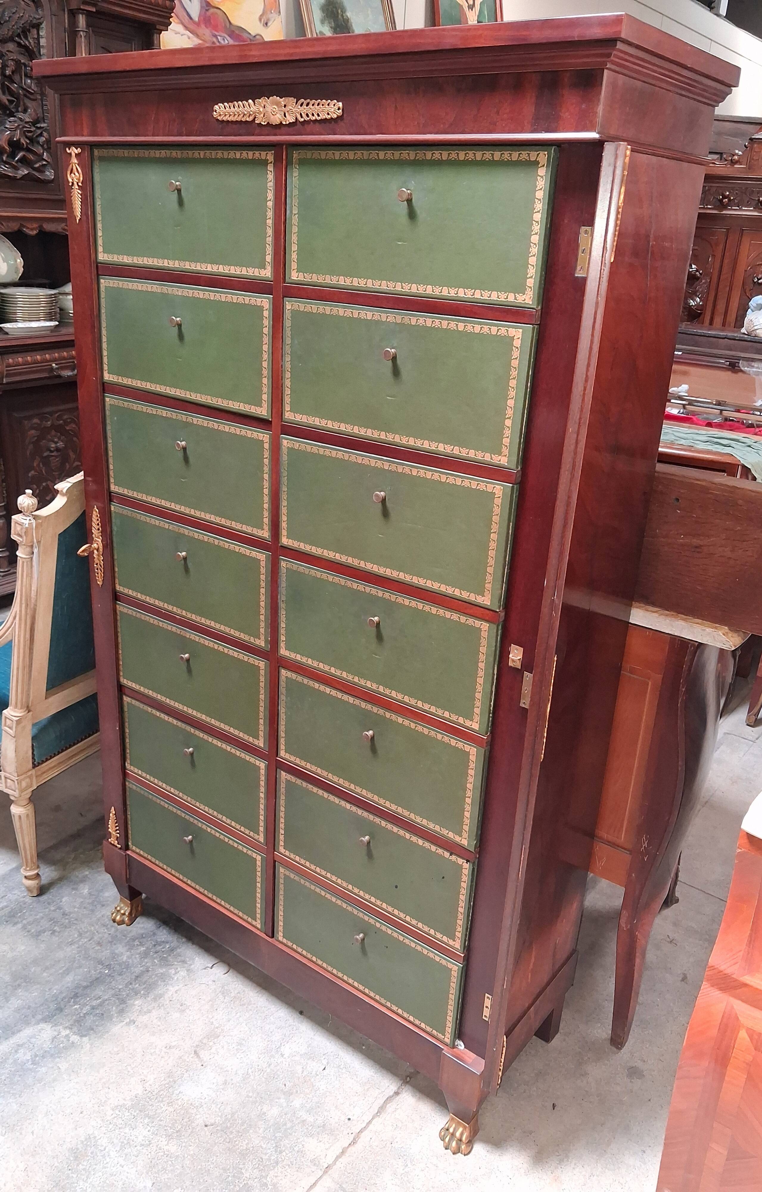 Empire-style mahogany cabinet – 12 drawers lined with green leather –