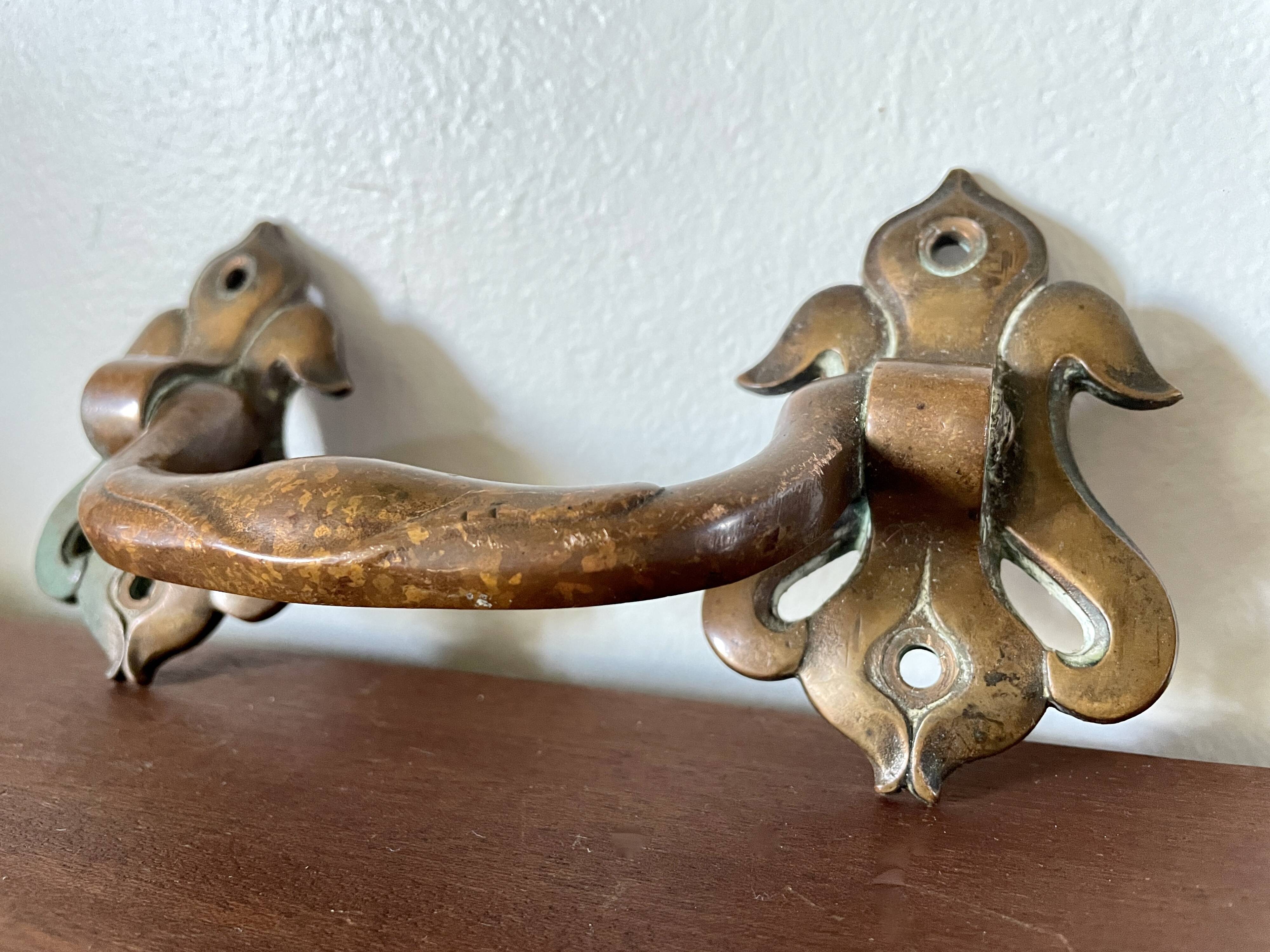 Pair of bronze handles by Emile Muller, 19th century.