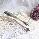 Ice cube pliers or sugar in's feet chiseled silver metal and punches