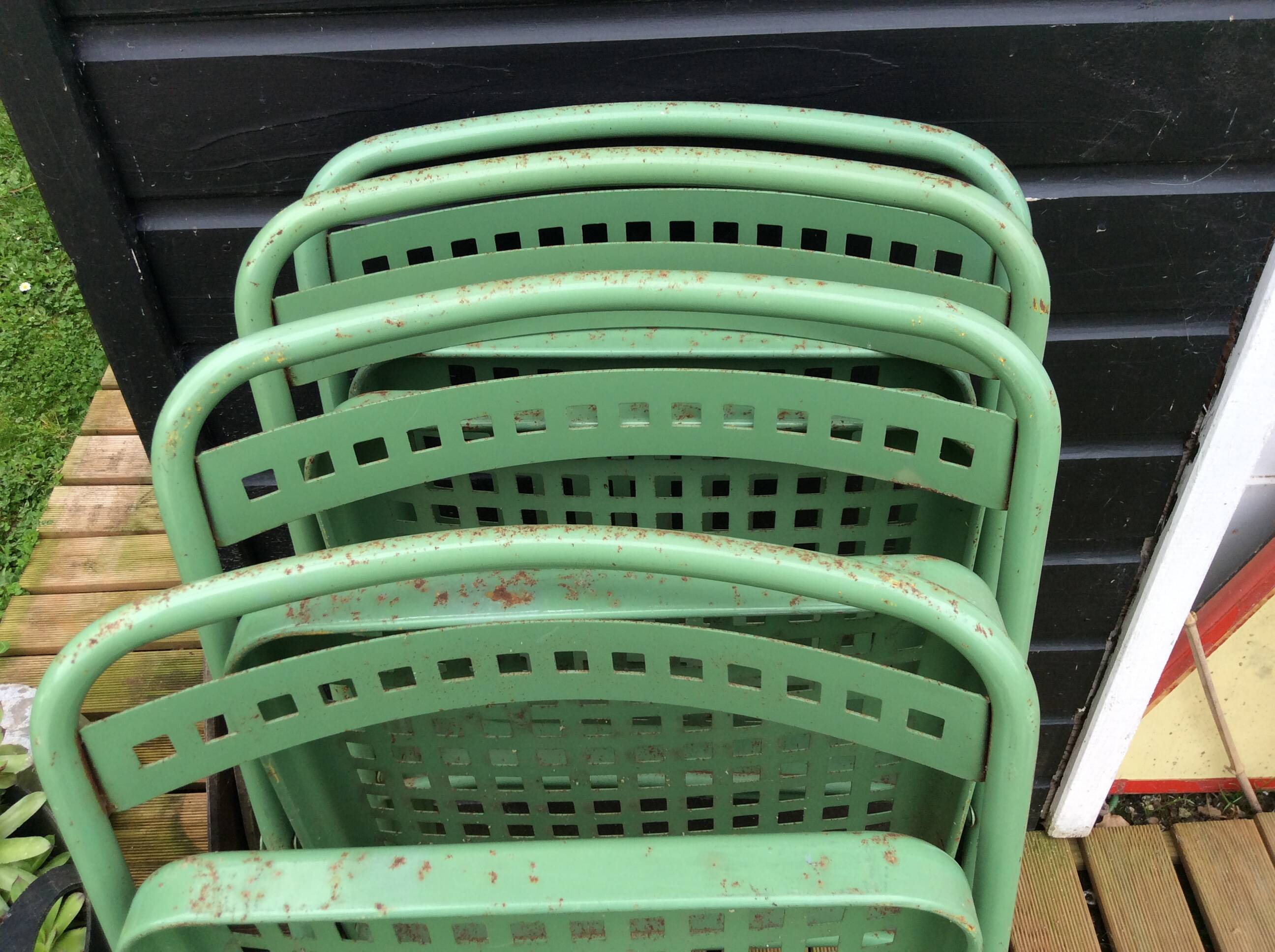 4 folding sheet metal chairs