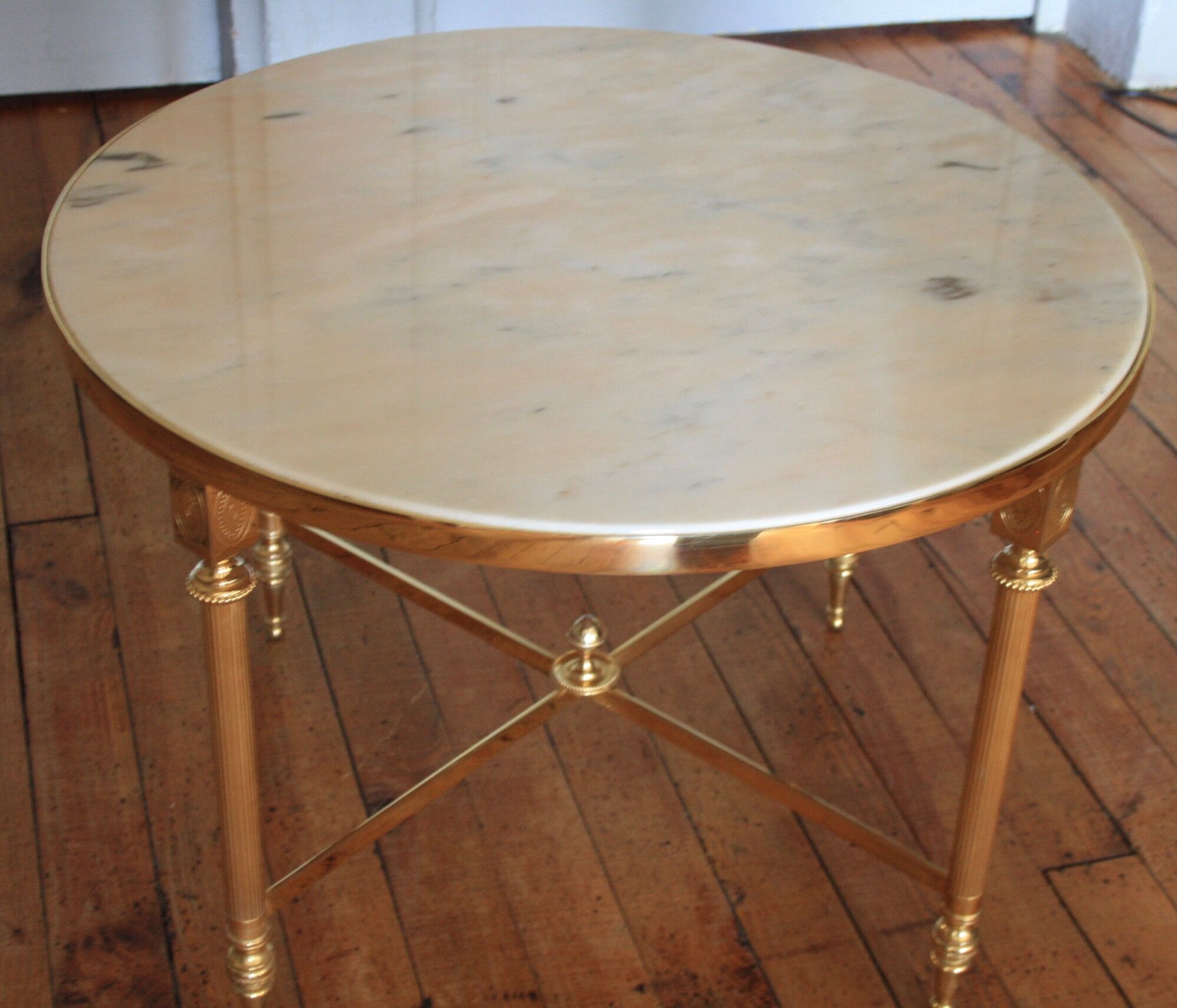 Marble and brass round coffee table