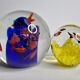 Set of two sulphides, glass paperweight with fish decorations