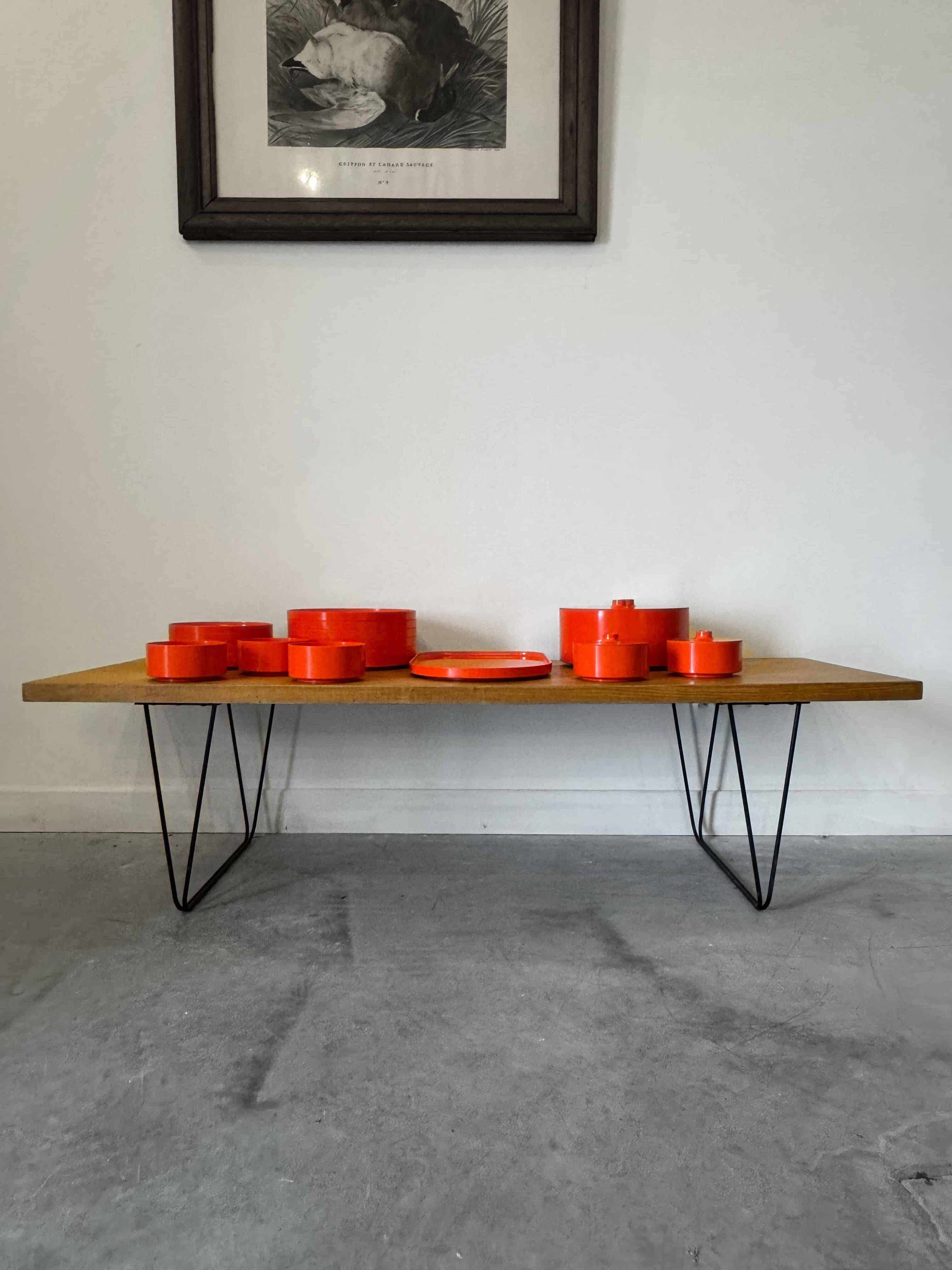Vintage “Max” orange plastic dinnerware set 1964
