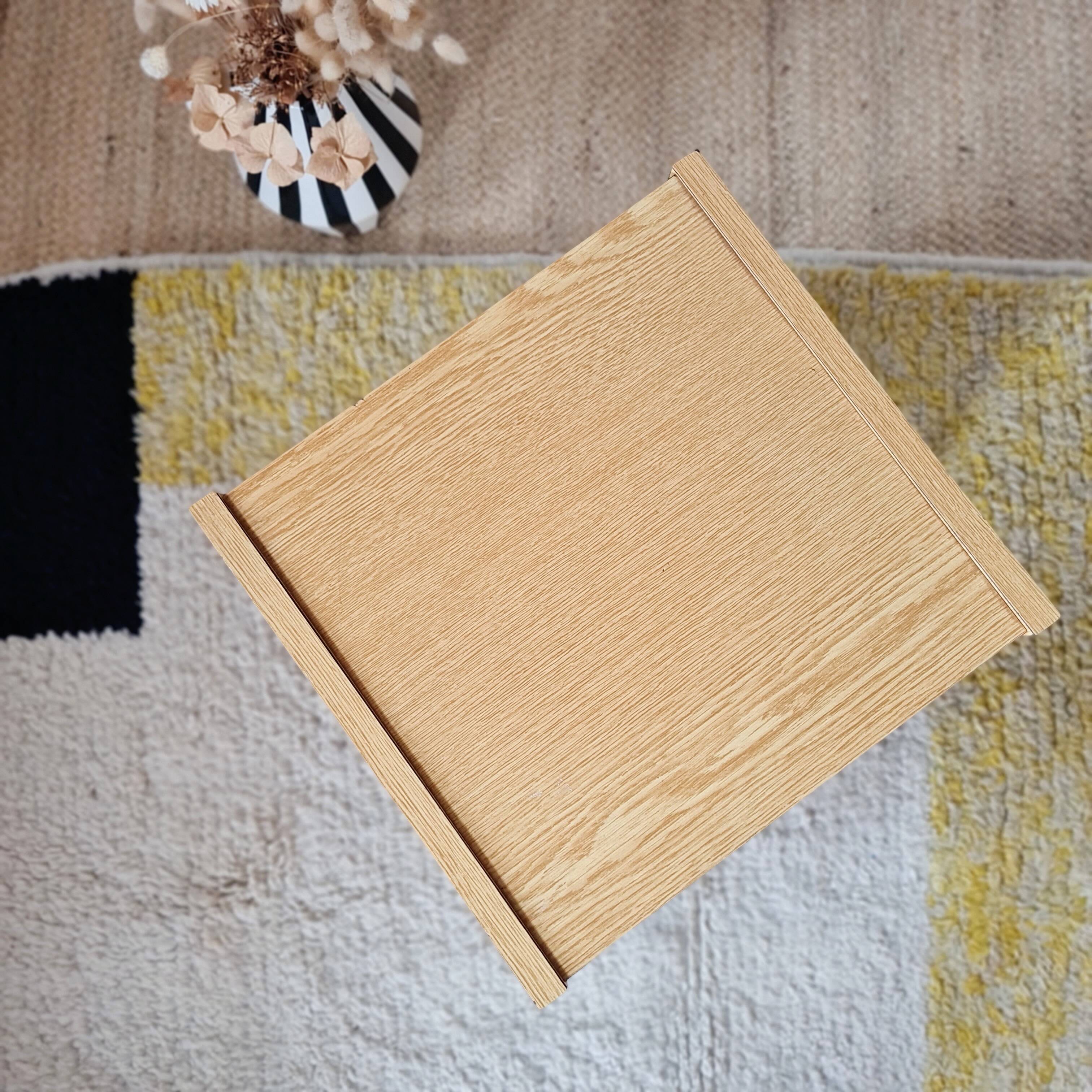 Bedside table - small wooden piece of furniture with a tubular metal base.