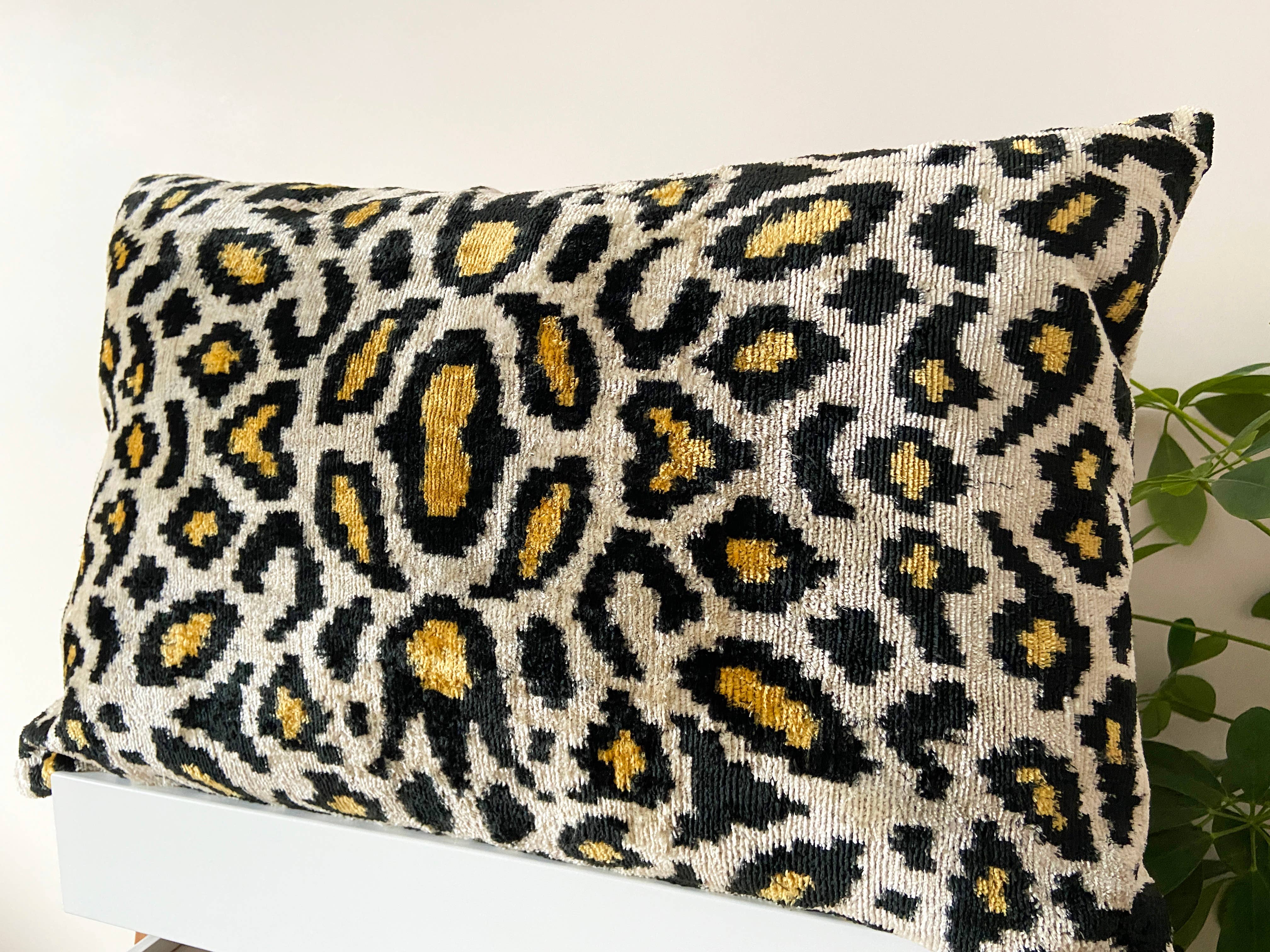 Ikat cushion in panther velvet