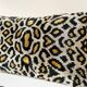 Ikat cushion in panther velvet