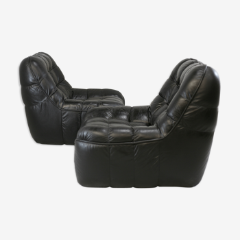 Pair of black leather armchairs, France, circa 1970