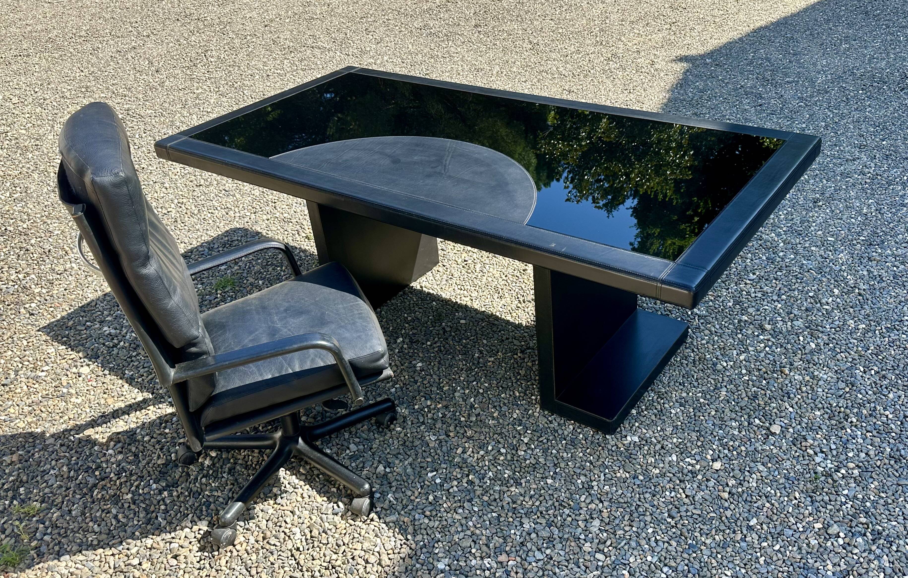 Executive desk by Guido Faleschini and armchair by Matteo Grassi