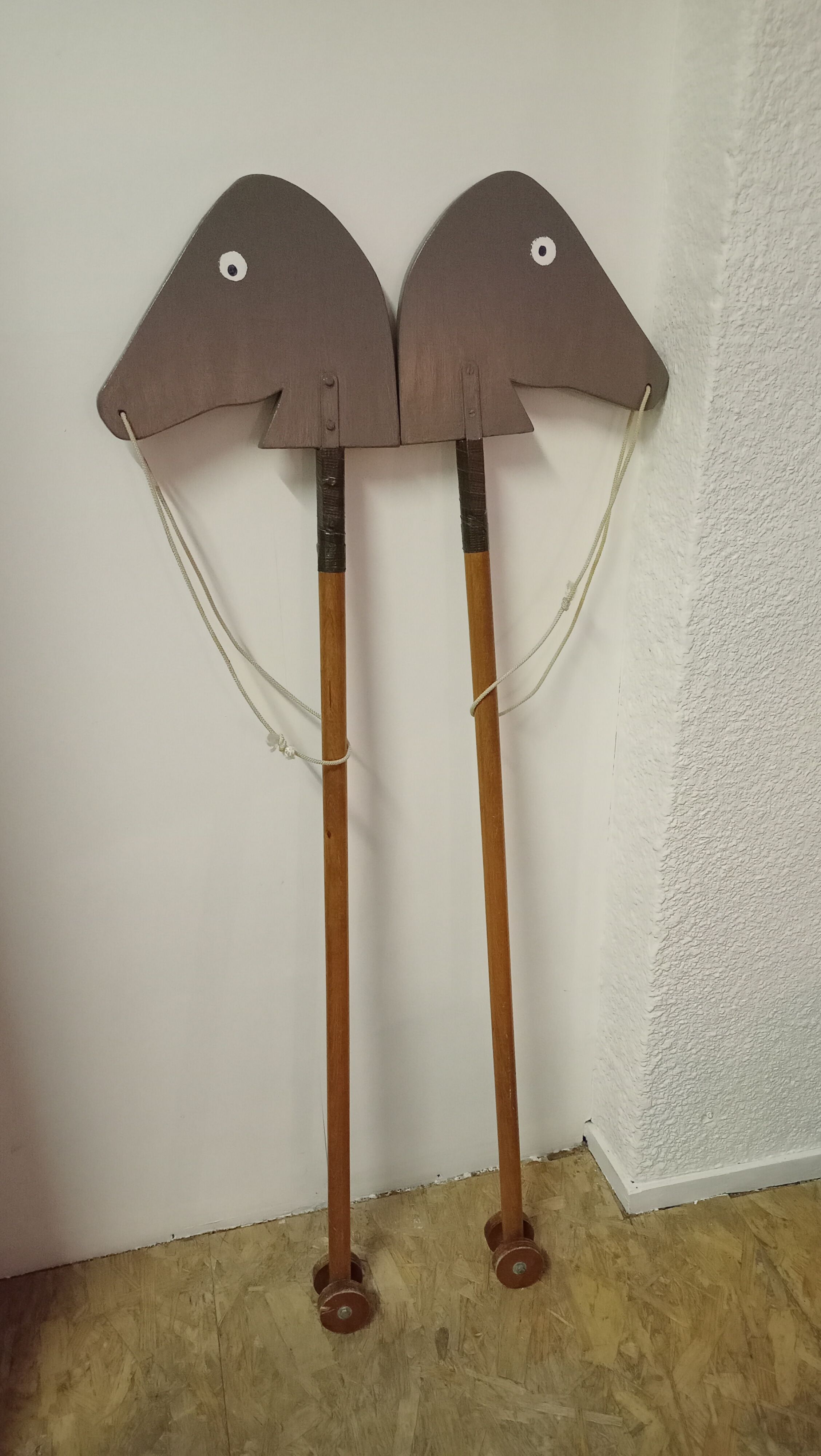 Wooden horses stick on wheels