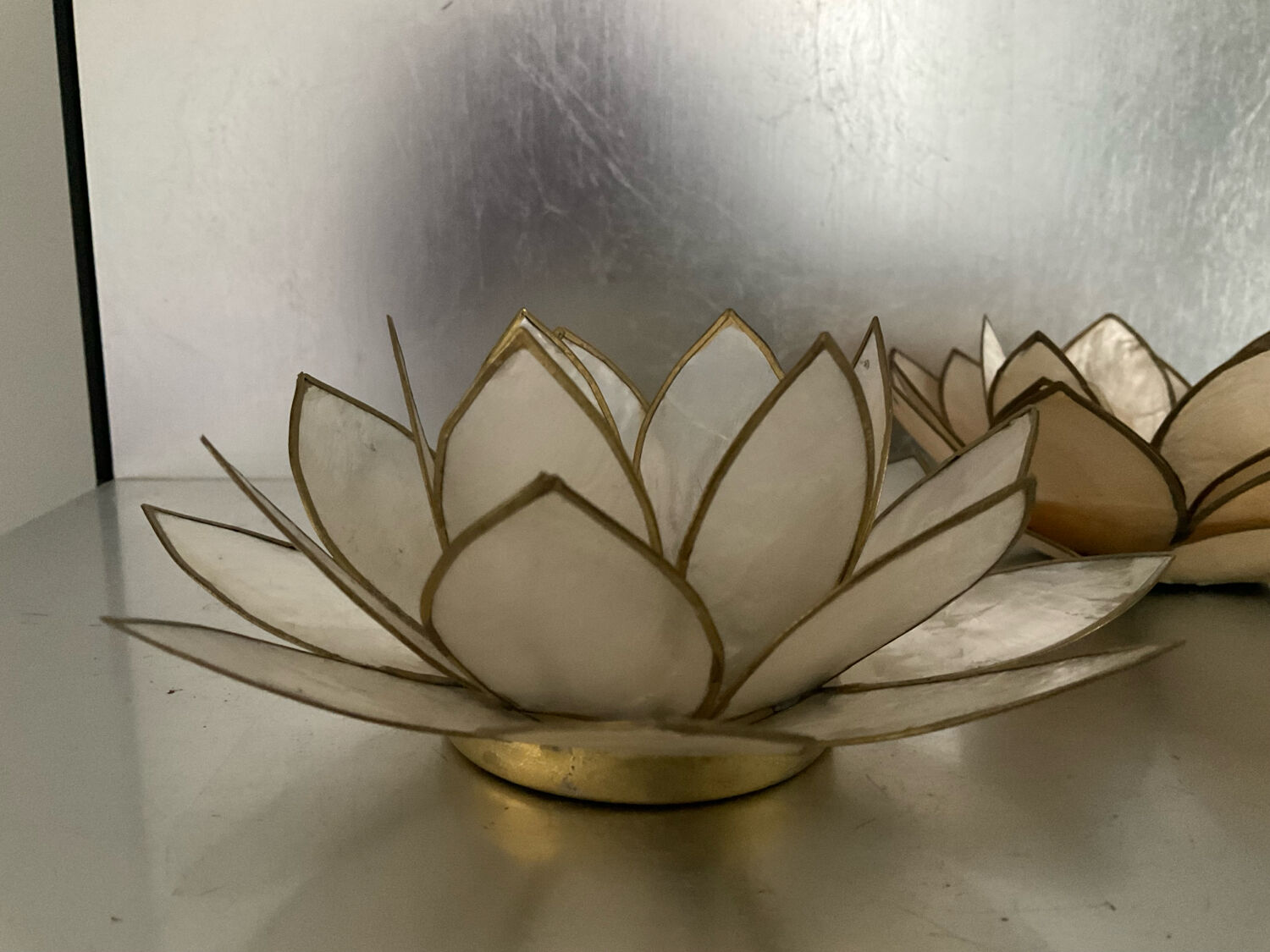 Pair of lotus candle holders in mother-of-pearl