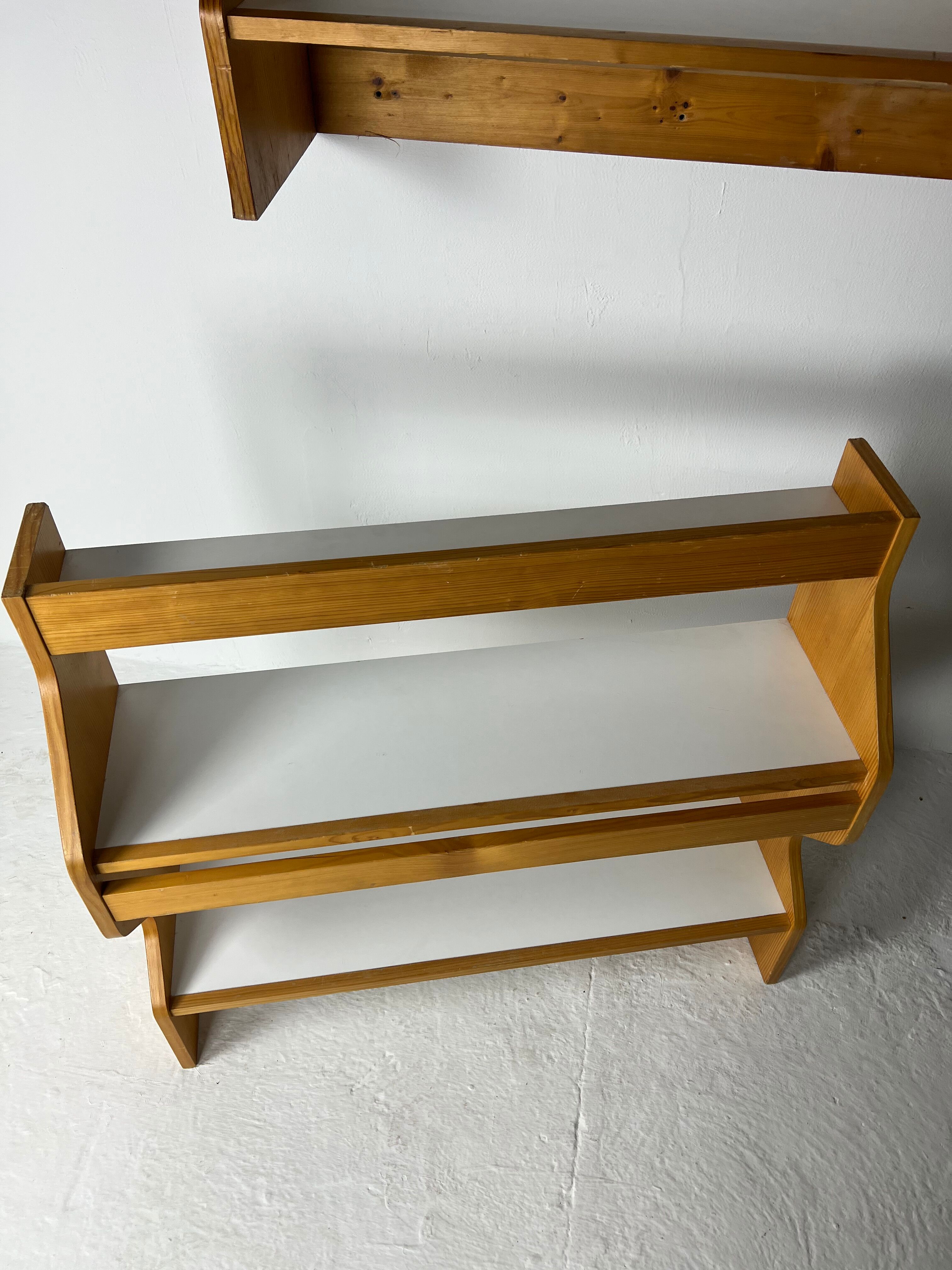 Duo of shelves by Charlotte Perriand