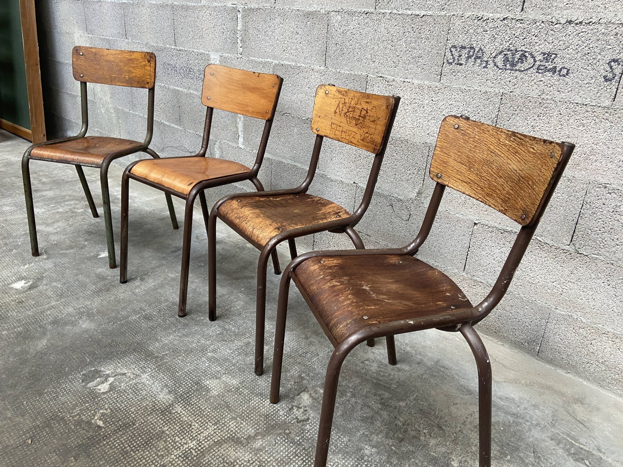 4 vintage school chairs