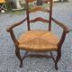 Fauteuil en chêne style Louis XV