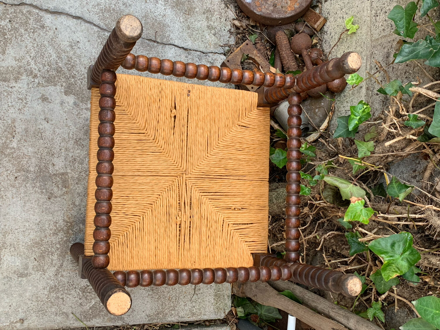 1920s turned wood straw corner chair