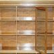 Library in the style of David Linley in satinwood, walnut, and rosewood.