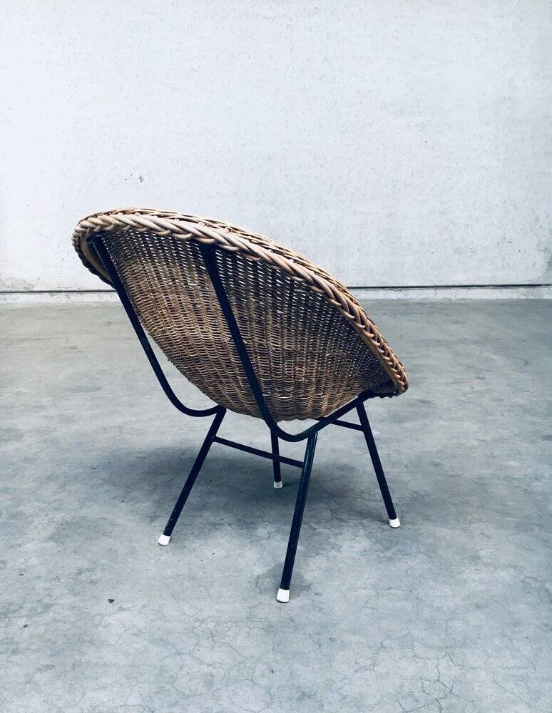 Wicker lounge chair in the style of Dirk Van Sliedregt for Rohé Noordwolde, Netherlands, 1960s.