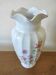 Vase en porcelaine décor floral,liseré doré
