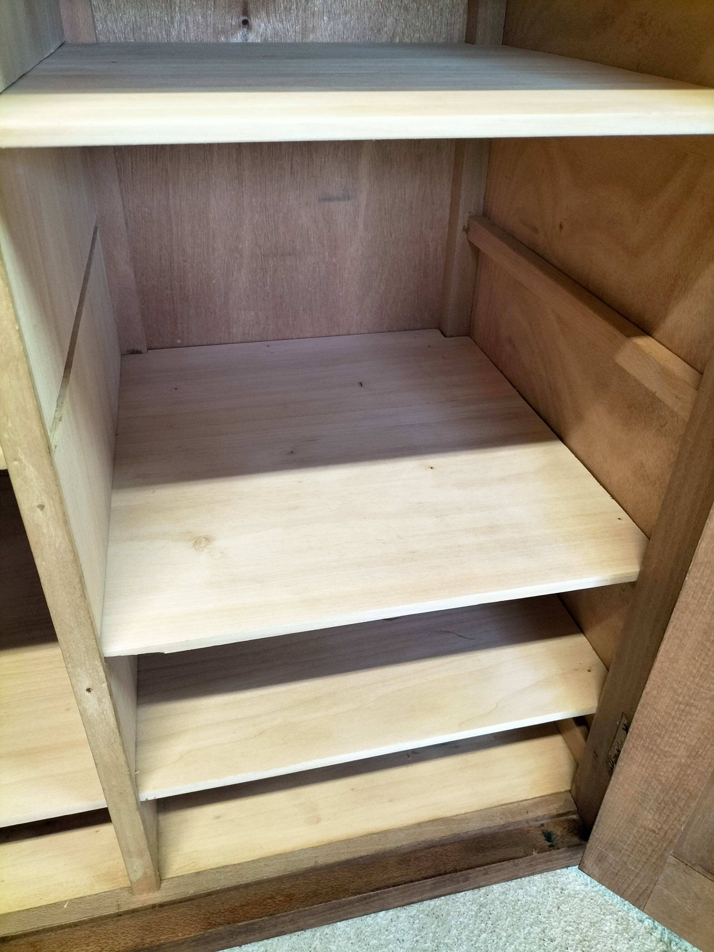 Small wooden sideboard with two doors.