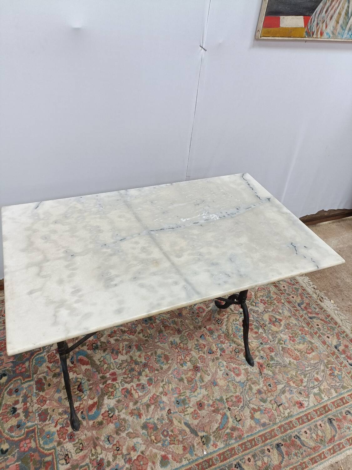 Bistro table with cast iron legs and marble top