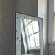 Vintage wall mirror in mint blue mosaic