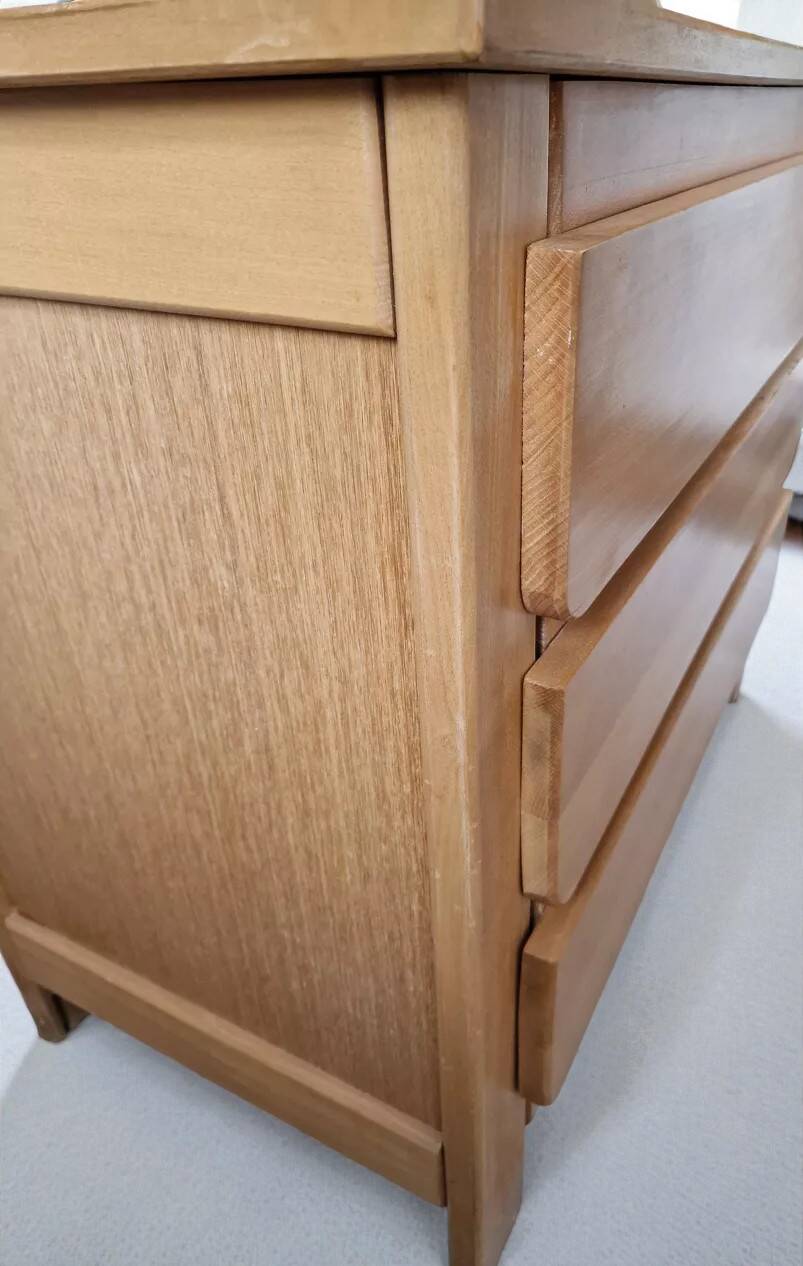 Commode style with rounded edges.