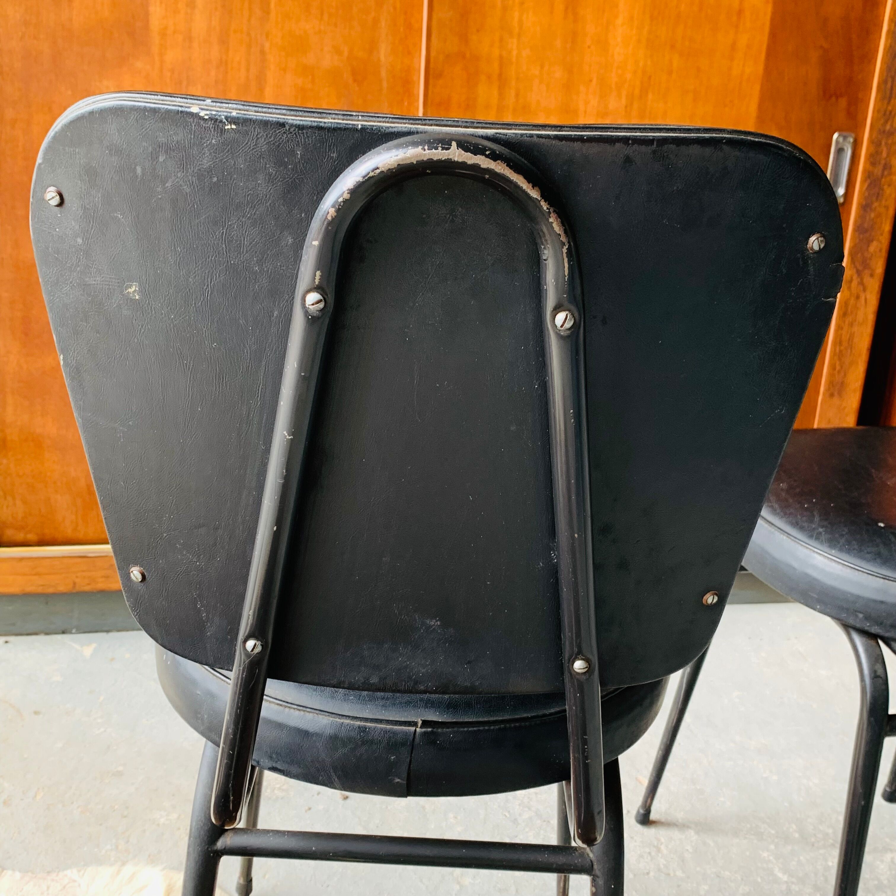 Pair of vintage black skai chairs