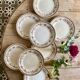Set of 8 old flat plates in iron earth, decorations of HBC swallows