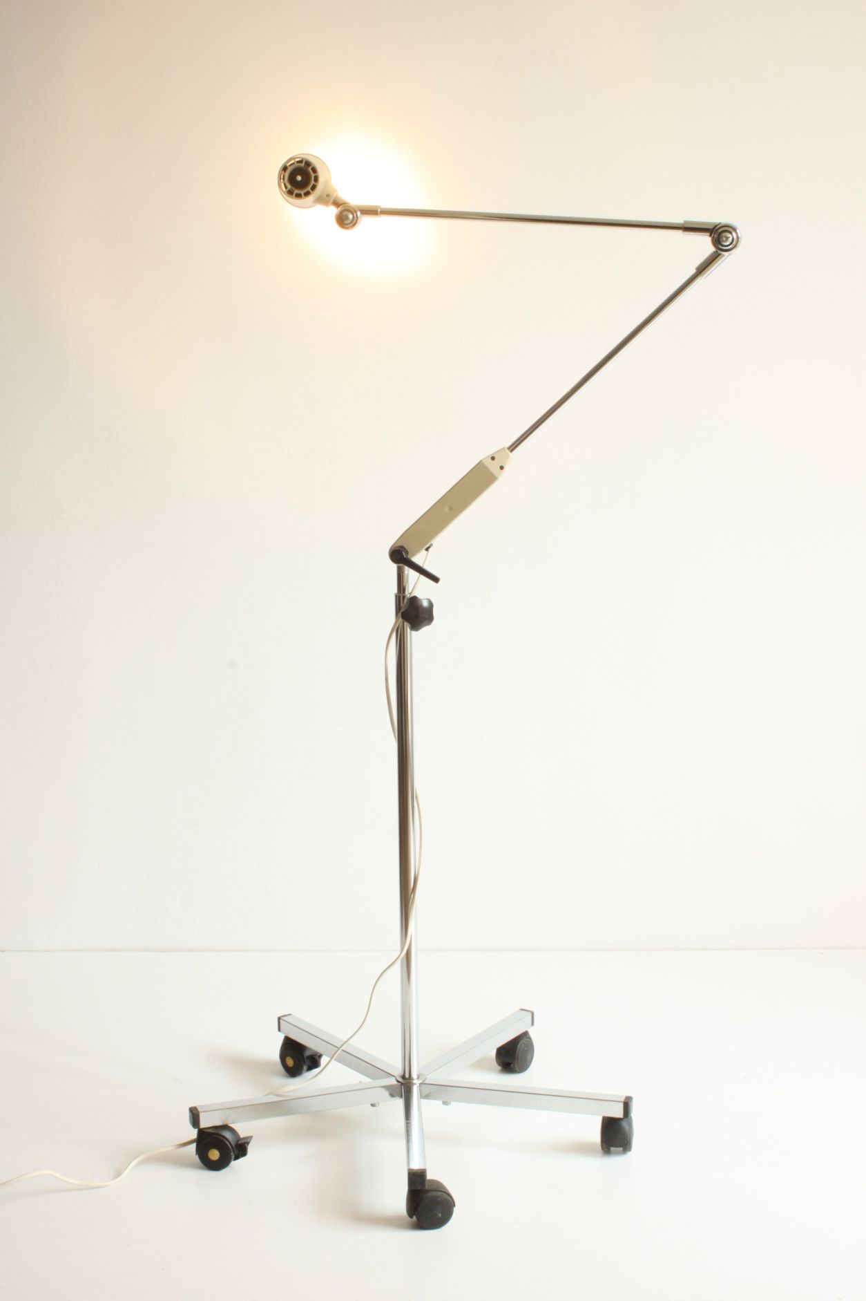 Vintage adjustable chrome medical precision light by Derungs Licht, Switzerland 1980s.