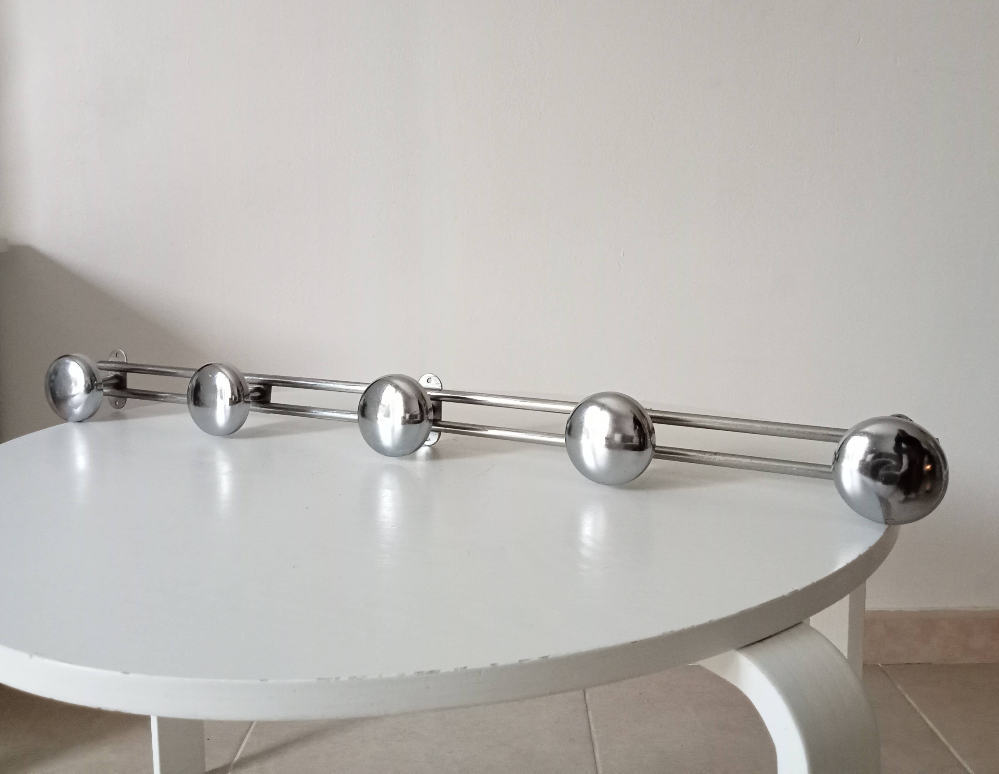Vintage chrome wall-mounted coat rack from the 1970s