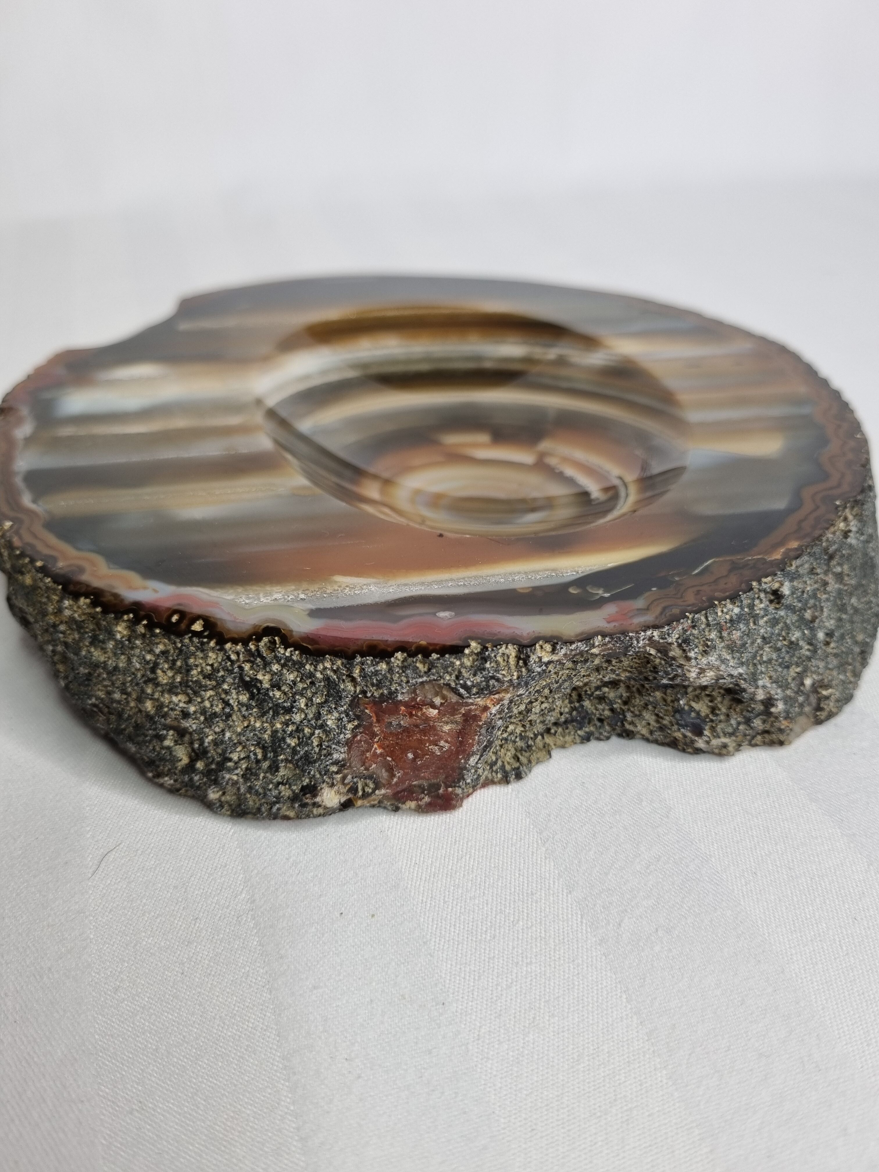Empty pocket, slice of brown ochre agate