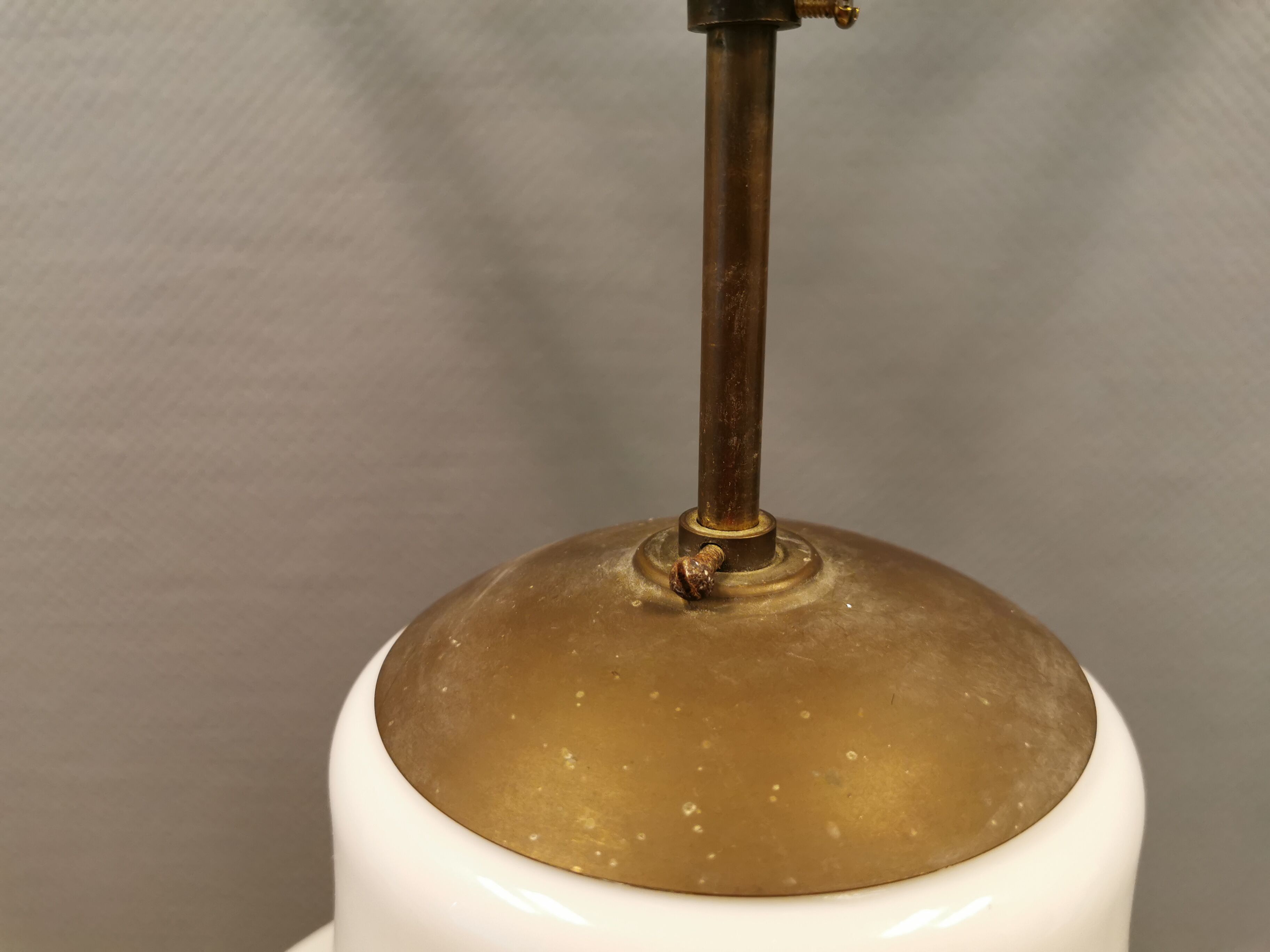 Older ceiling/hanging lamp in milky white opaline glass.